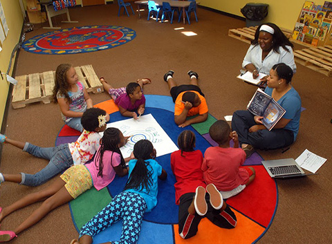 Children In Classroom During Story Time